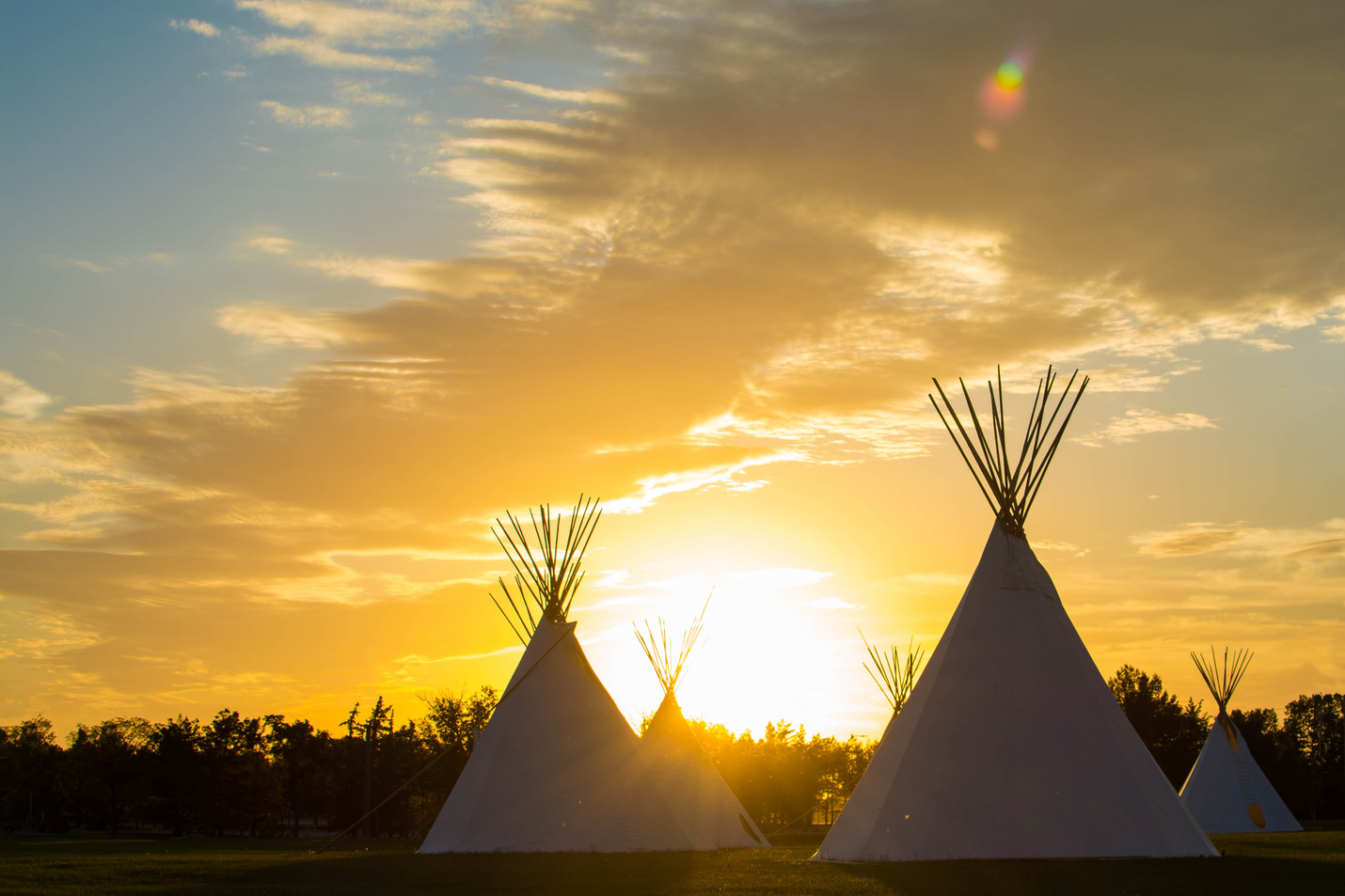 Native American Teepee On the Prairie at Sunset